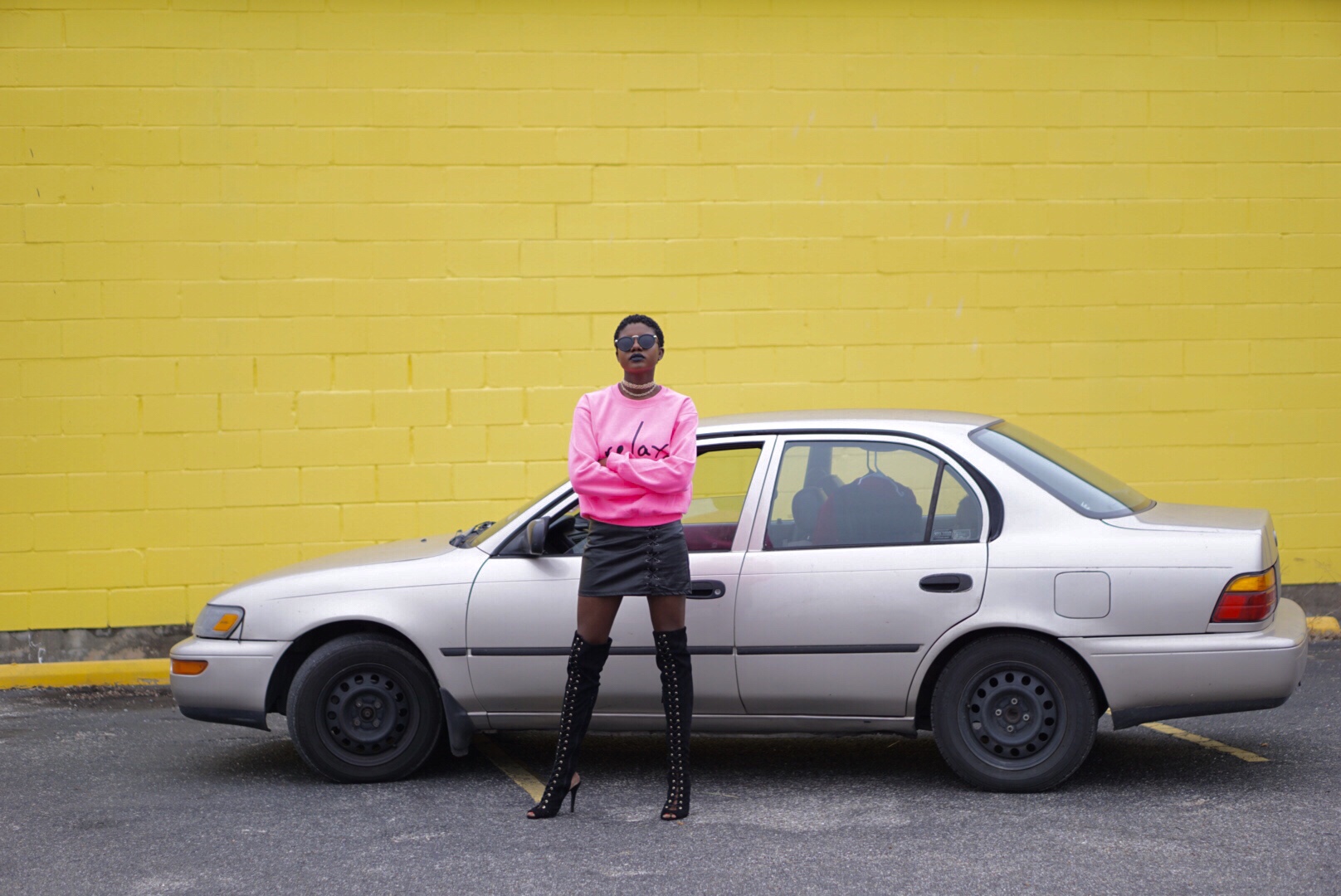 black lace up over the knee boots, hot pink sweat shirt, relax, edgy style, keep your old car, 1993 toyota corolla