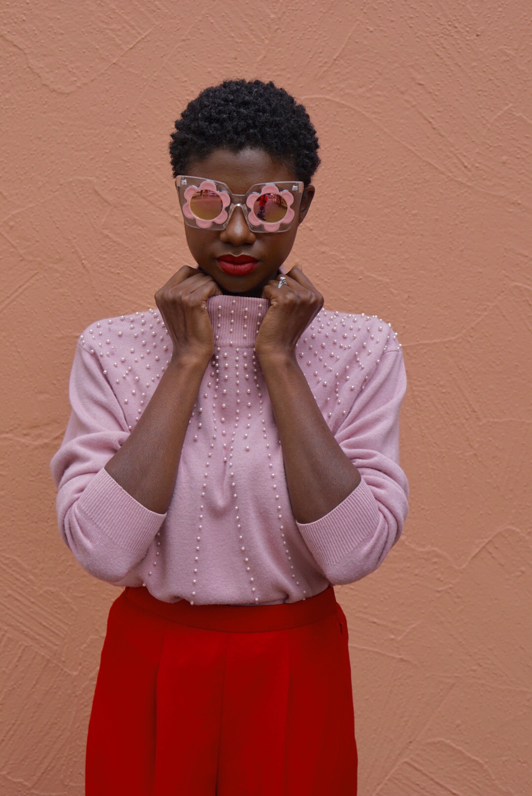 Valentines day outfit, red and pink, color blocking, pearl detail, short natural hair, sequins purse, red converse, flower sunglasses