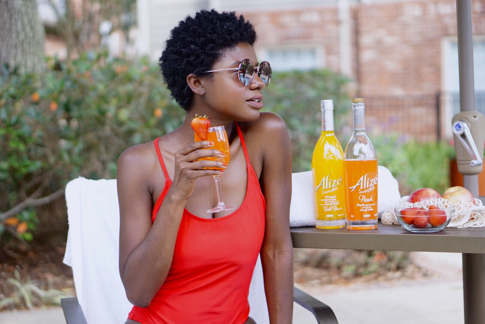 Summer Cocktails, easy summer cocktails, Alize, Alize recipes, fruity cocktails, fruity drinks, twa, dark skin girl, red swimsuit, short natural hair, pool side